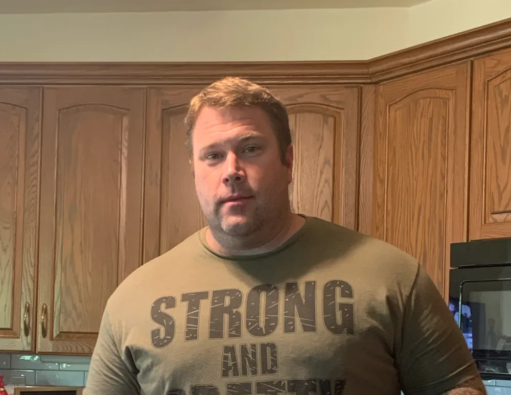Tommy Richardson in a kitchen during an earlier period of his life, when he was still working and training hard